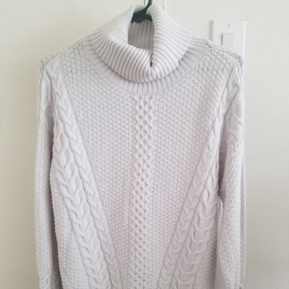 white cable knit turtleneck